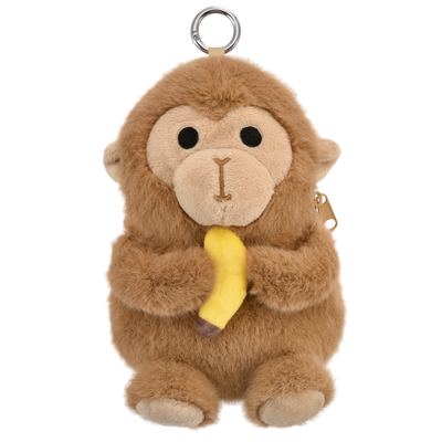 A plush monkey keychain or pouch featuring a brown furry body, beige face and feet, holding a yellow banana, with a metal key ring at the top and a small gold zipper pull on the side, shown on a plain white background.